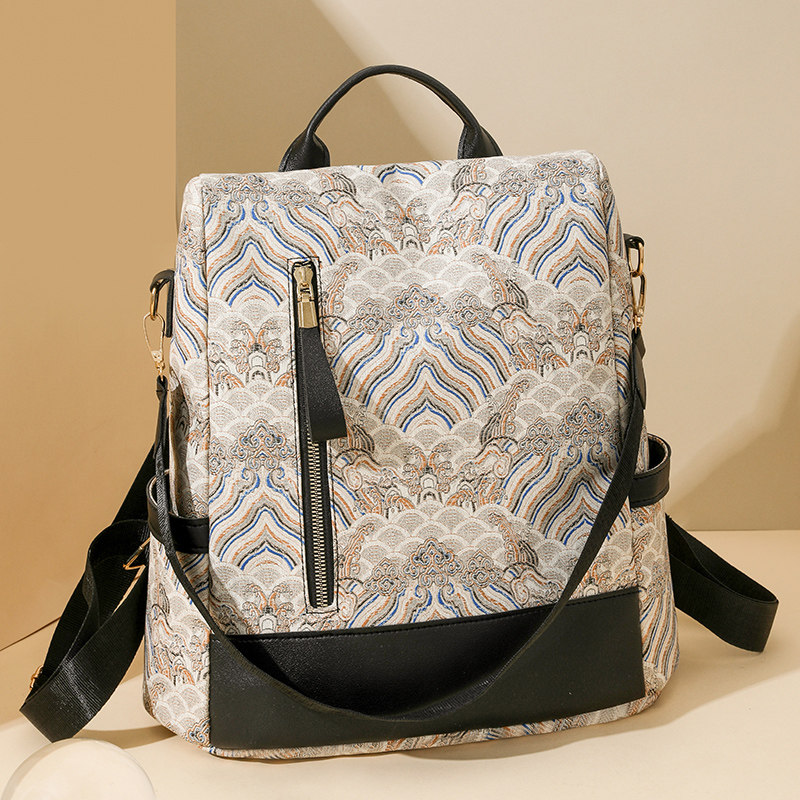 双肩包女2024新款潮流印花背包百搭休闲大容量书包油画轻便两用包