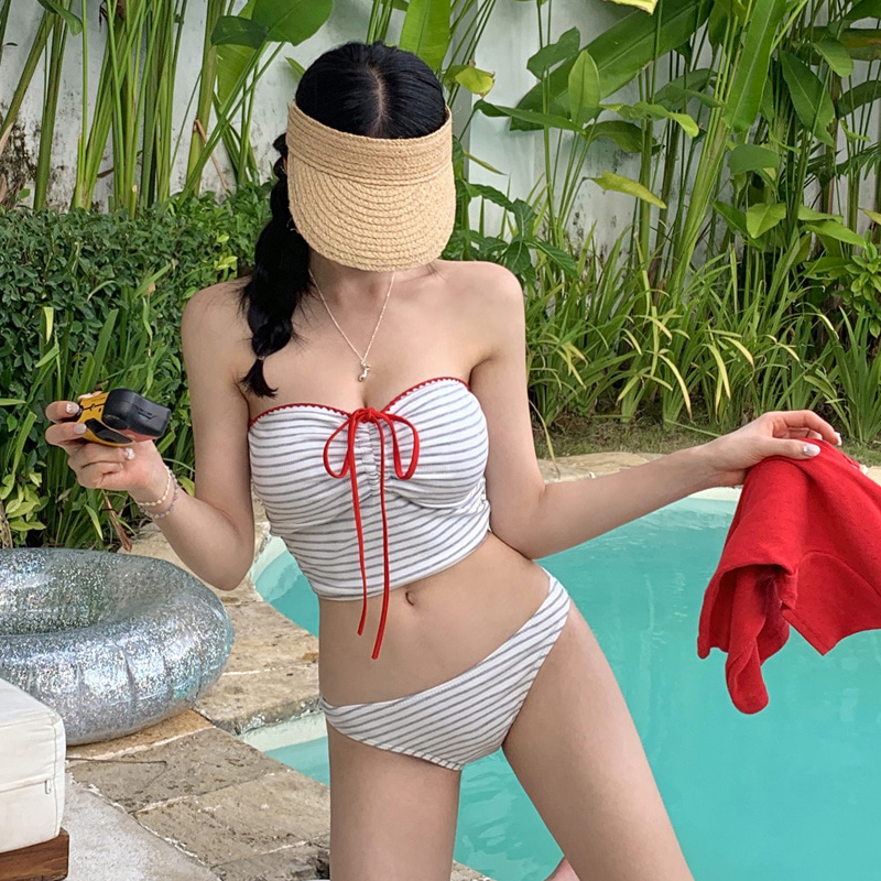 特价2025新款泳衣女三角连体性感纯色简约显瘦露背温泉度假泳装