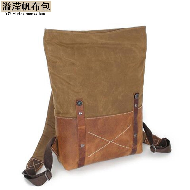 欧美时尚帆布双肩包配头层皮欧美复古背包男士旅行袋耐磨油蜡帆布