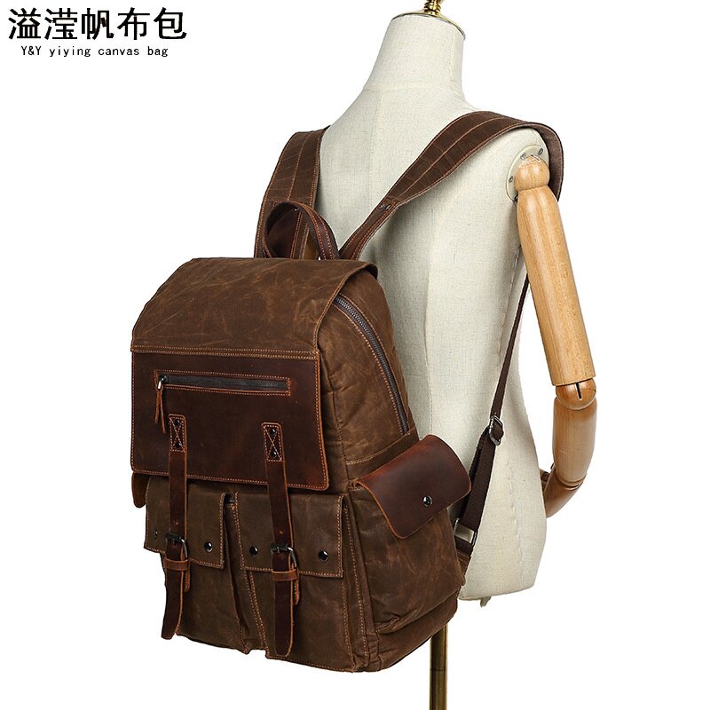 欧美时尚书包大中学生双肩背包男户外旅行电脑袋复古防泼水油蜡