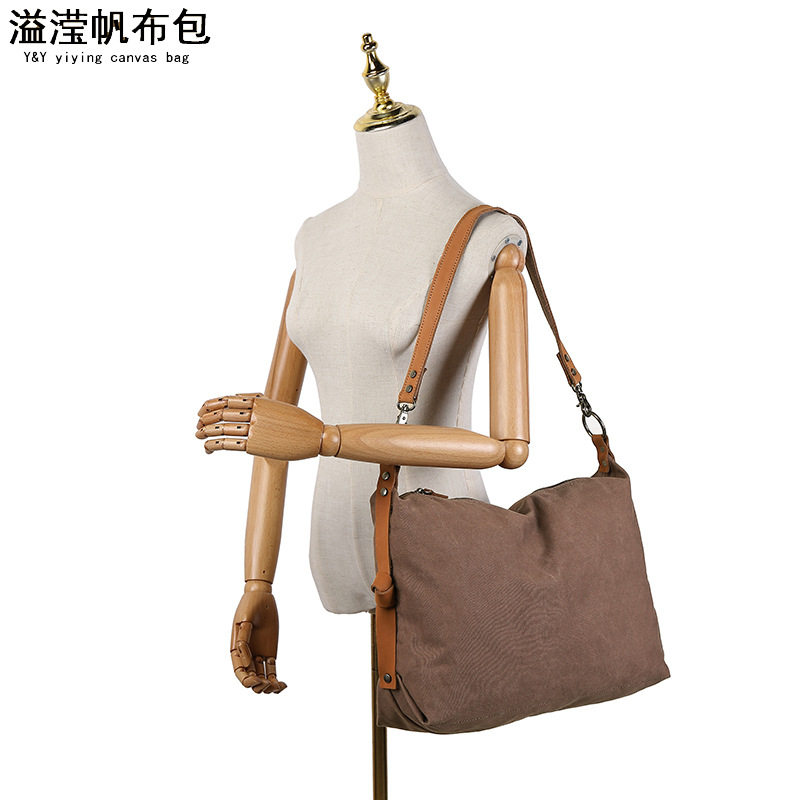 欧美时尚休闲女手提包 防水帆布斜跨包 配头层真皮纯色单肩包溢滢