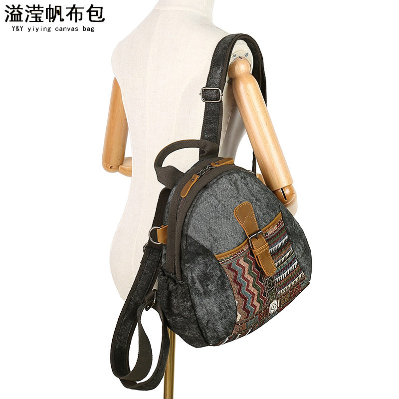 欧美时尚防水帆布配头层皮女双肩包民族风花纹跨境旅行背包溢滢