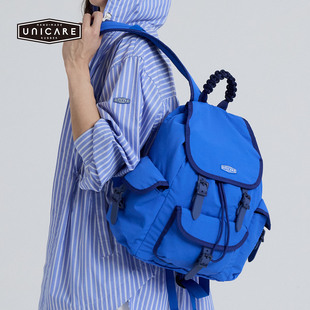 UNICARE复古双肩背包防水大容量 户外旅行登山运动轻便包男女2026