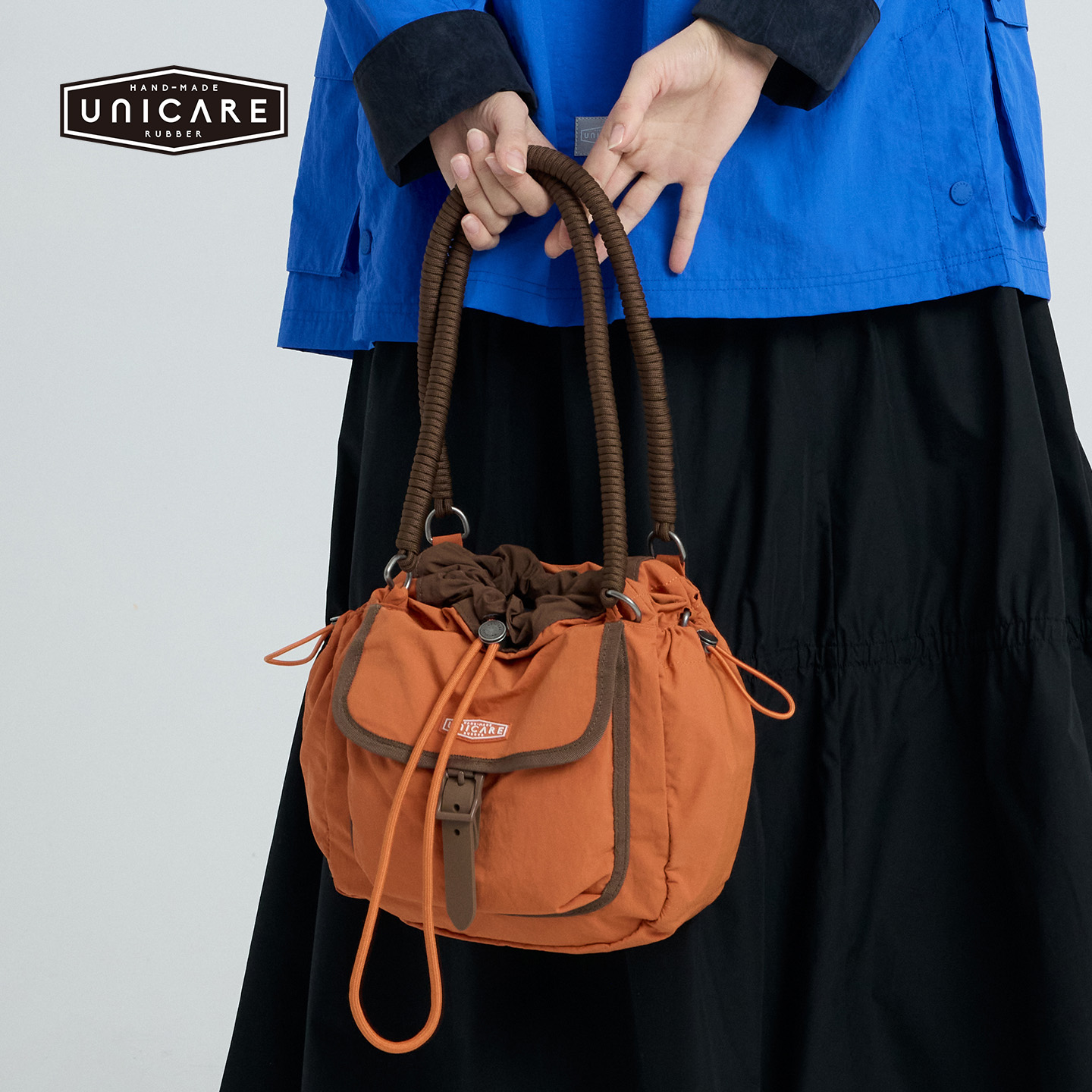 UNICARE运动休闲户外复古旅行包 手拎单肩斜挎包2026新品