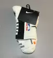 White and Black Low-Top Sneakers with a Chunky Sole