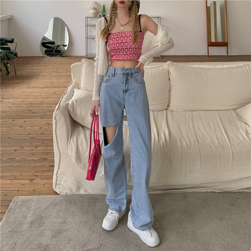 A pair of straight tube loose, thin, high and versatile jeans floor pants with holes