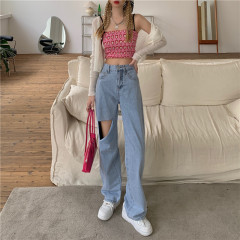 A pair of straight tube loose, thin, high and versatile jeans floor pants with holes