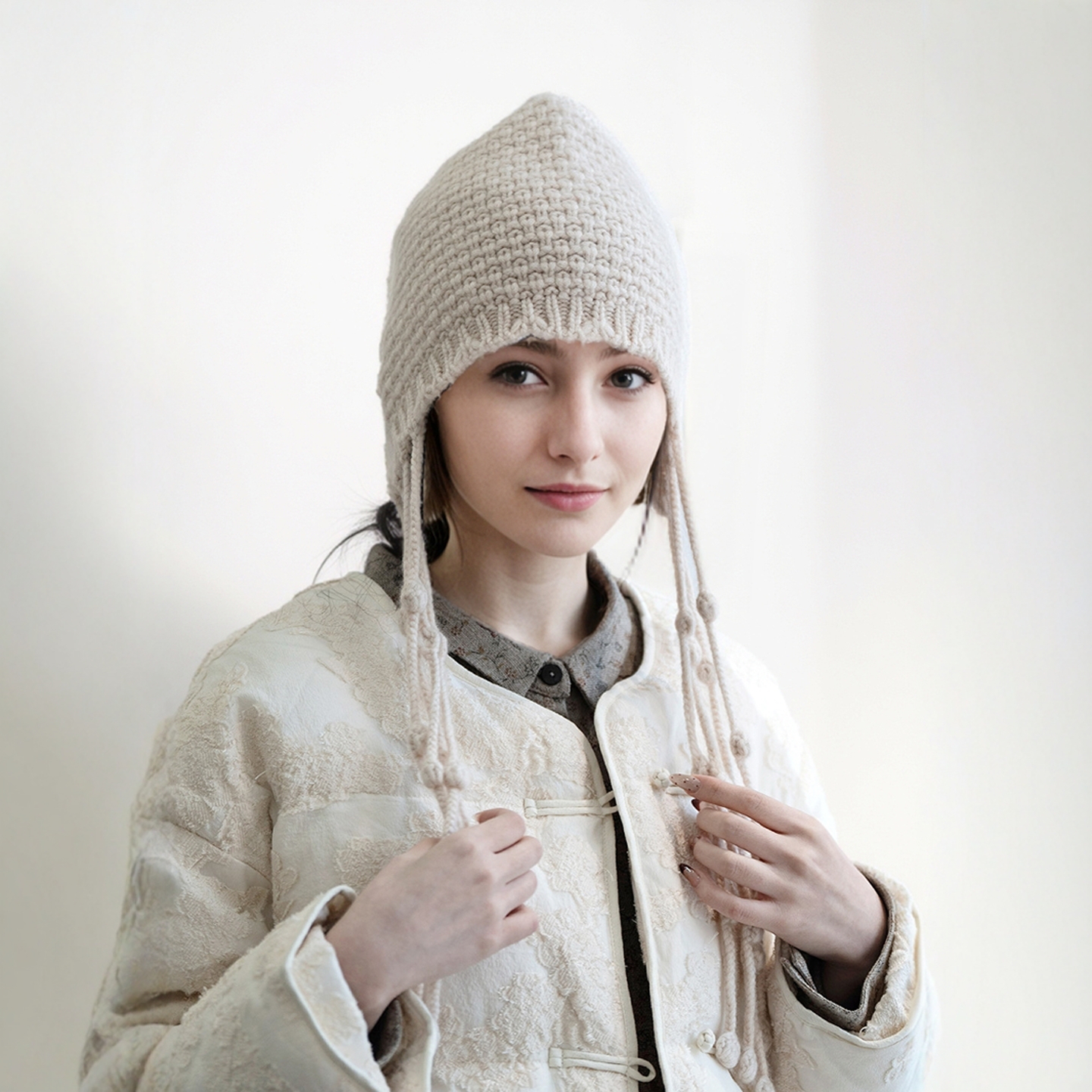 民族风山羊绒两色护耳流苏帽子