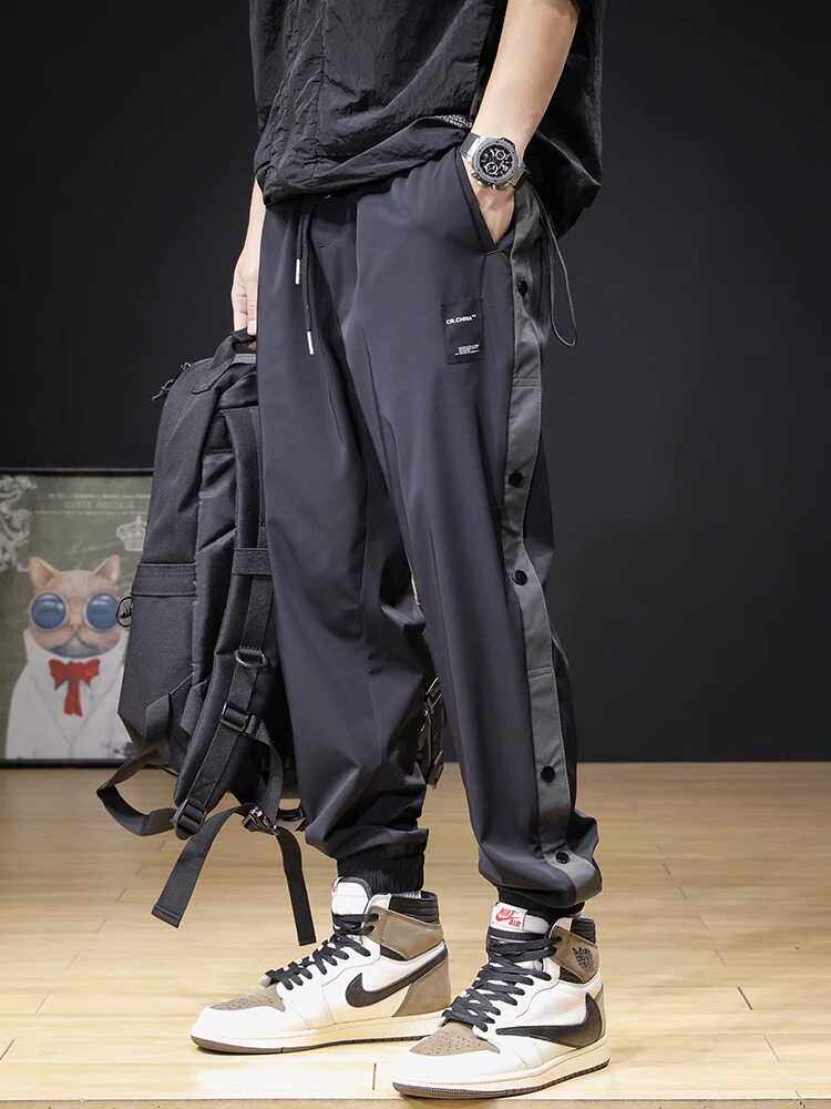 夏季薄款冰丝凉感排扣休闲运动裤男潮牌束脚大码男士速干跑步裤子