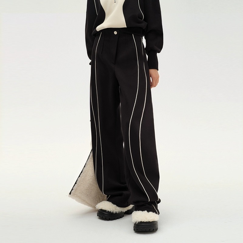 NMORE设计师品牌 隐秘黑斜搭门S形曲线装饰边卫裤