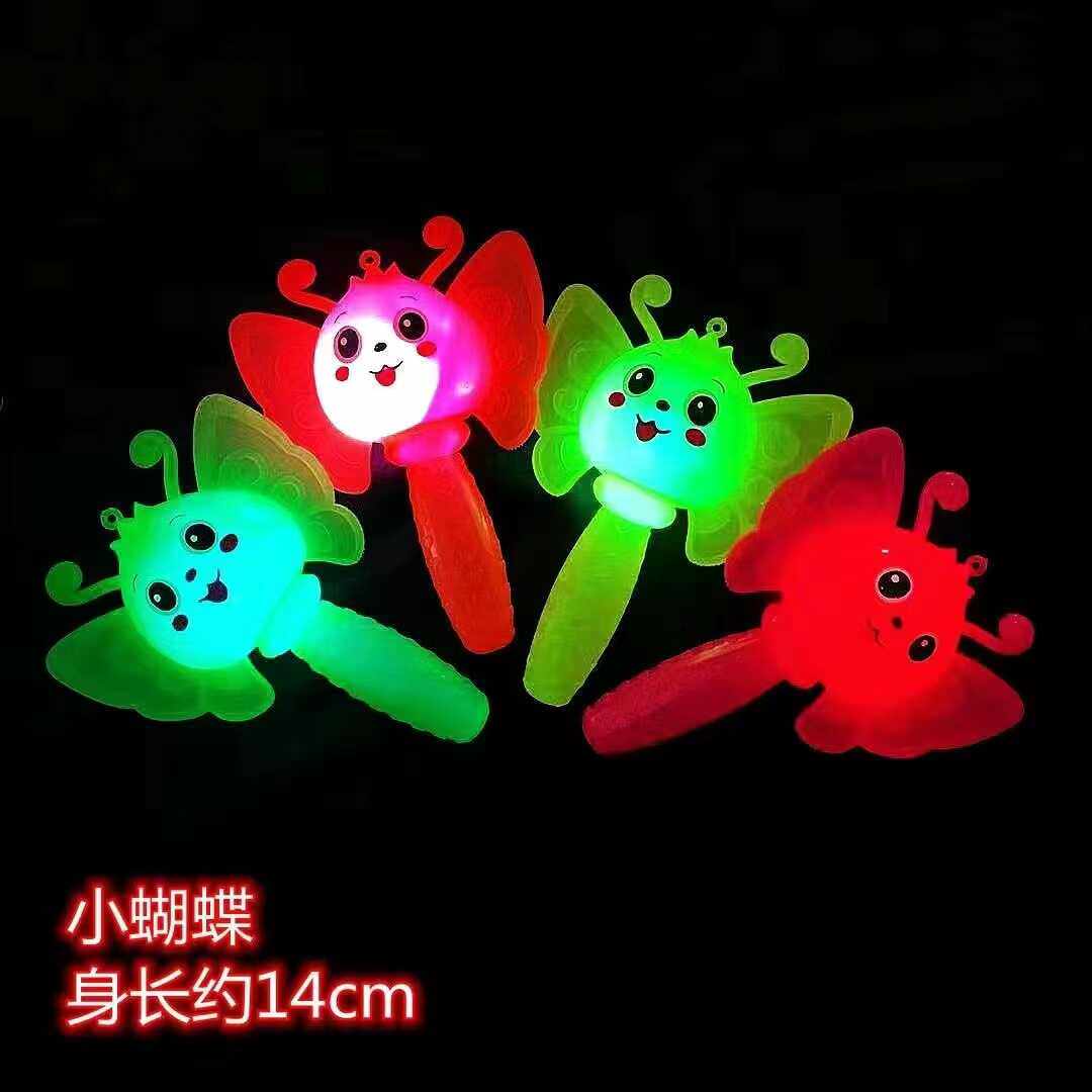 发光热卖礼品地摊捏下带哨子