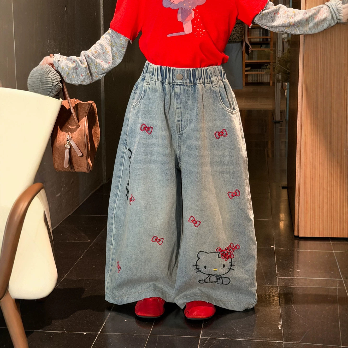 半柚童裤2026秋季女童韩版满印卡通牛仔裤儿童休闲宽松阔腿长裤子