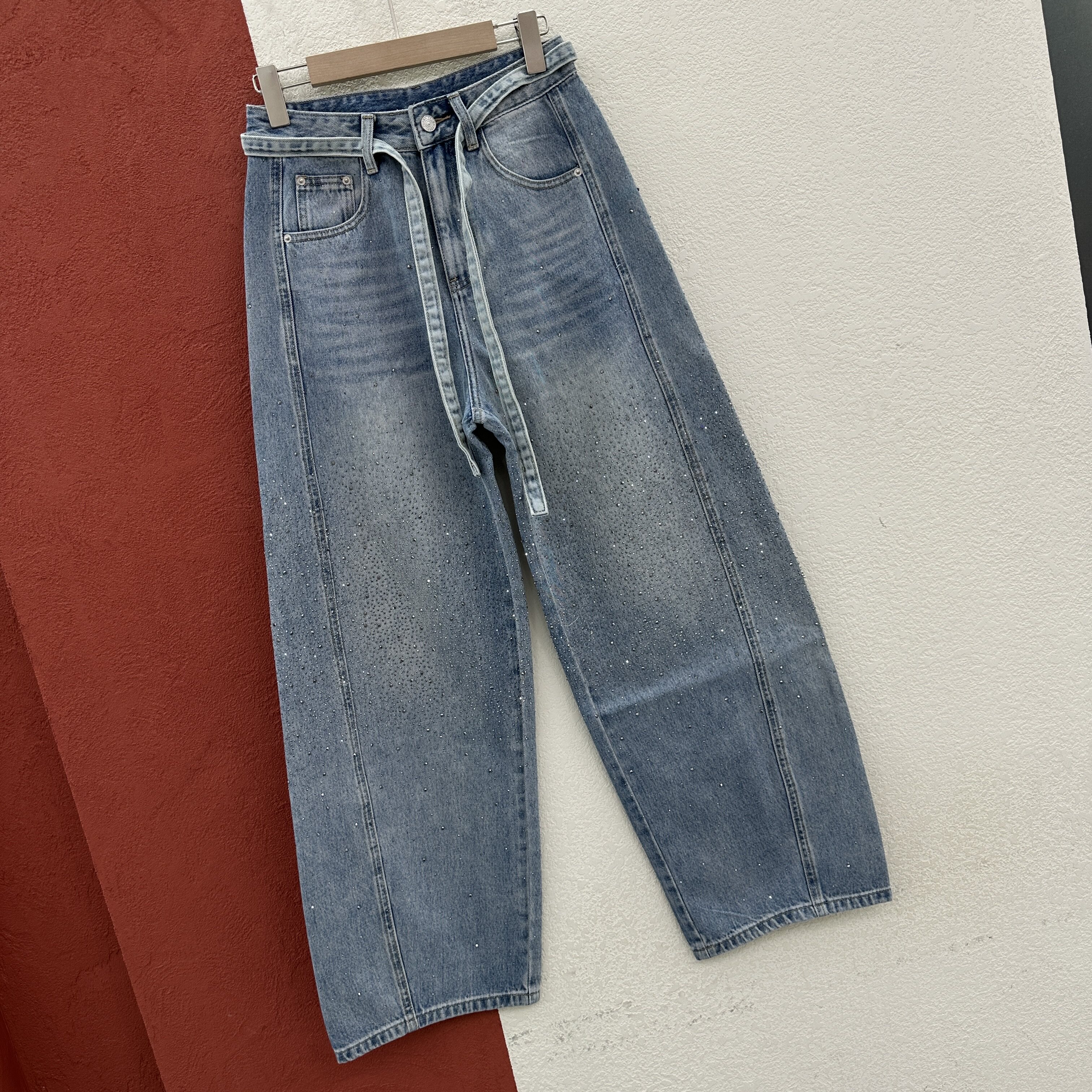 春款FASHION JEANS酷希莱61259牛仔裤女浅蓝色高腰烫钻弯刀裤长裤