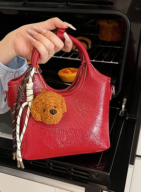 洋气甜美小众设计红色包包手拎斜挎包女款2025新款潮百搭水桶包