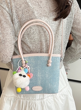 今年流行超火蓝色手拎水桶包斜挎手机包2025新款潮百搭小包包女款