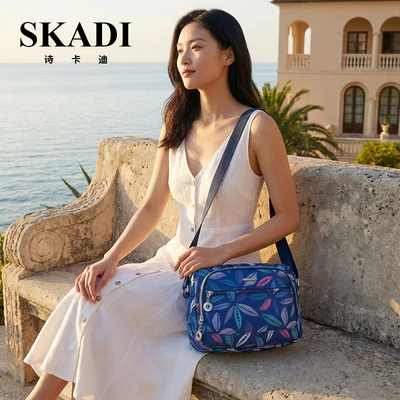 女叶子印花防水大容量斜挎包