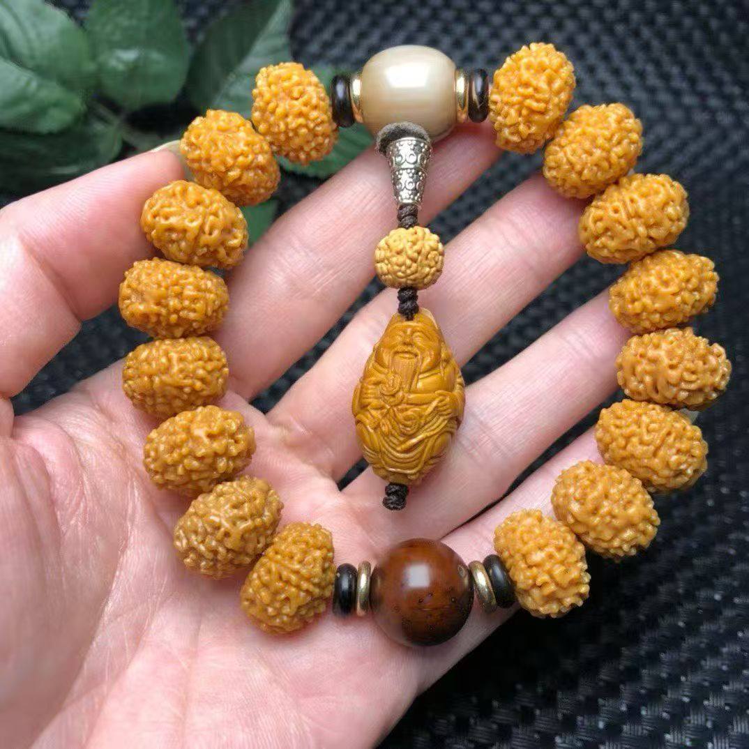 8瓣16mm小金刚飞蝶矮桩菩提子天然玉化籽金黄皮高密沉水手串佛珠