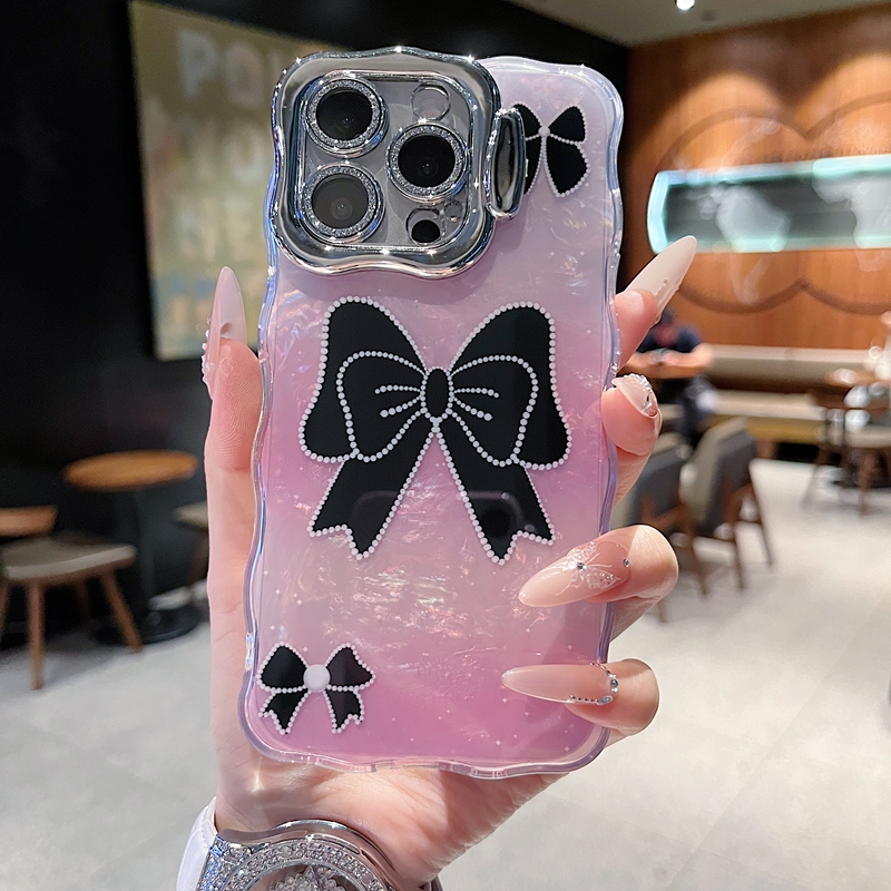 适用苹果系列iPhone16新款手机壳15pro14promax小众时尚黑色蝴蝶结13/16promax全包隐形支架镜头膜网红保护套