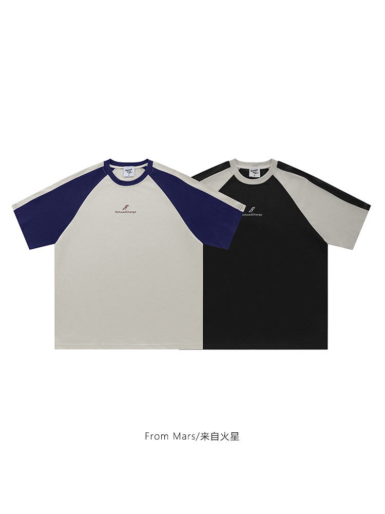 FROM MARS IS A LOOSE AMERICAN RAGLAN A SHORT-SLEEVED SHORT-SLEEVED T-SHIRT A CONTRAST LETTER