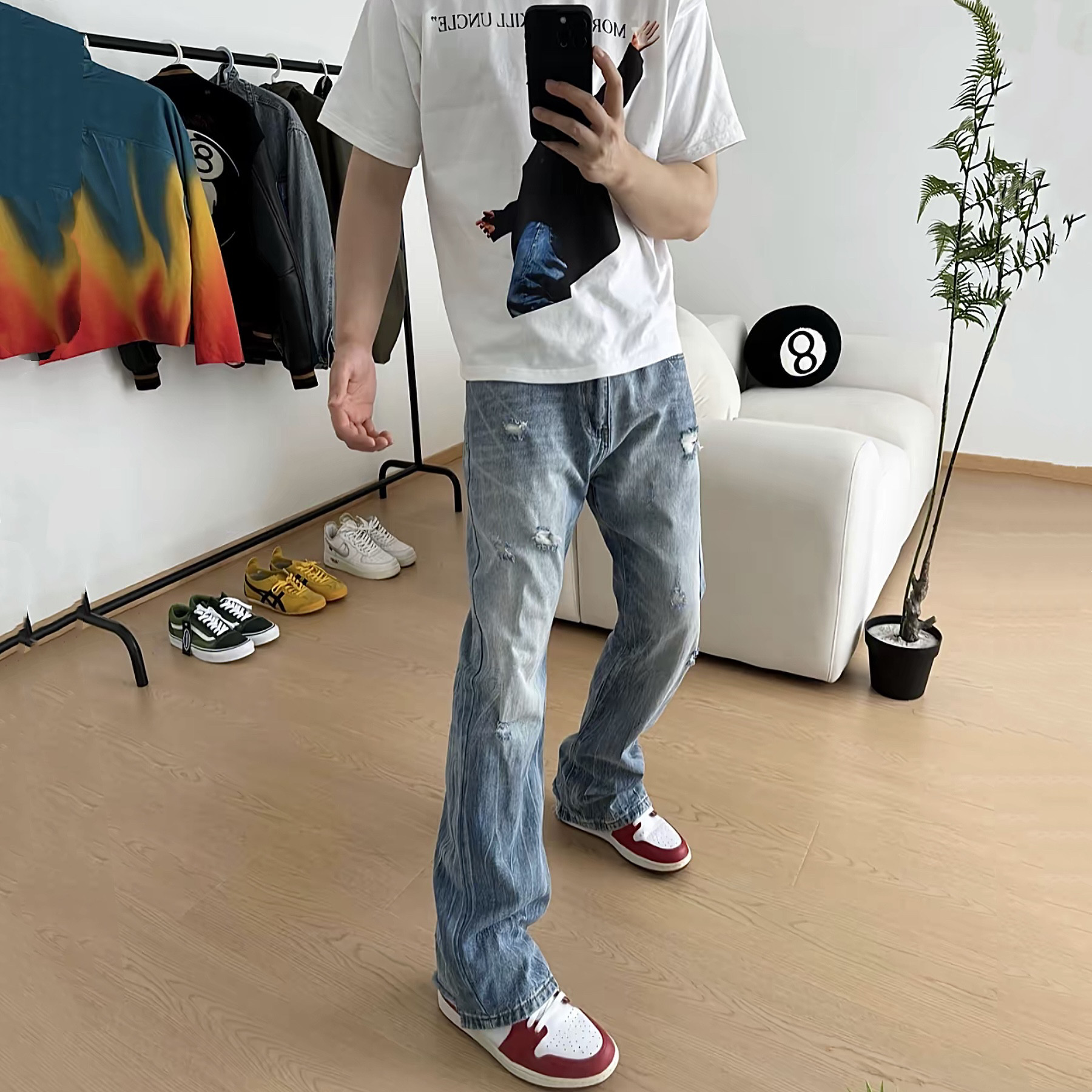 vibe风水洗冰蓝色流苏破洞牛仔裤图片