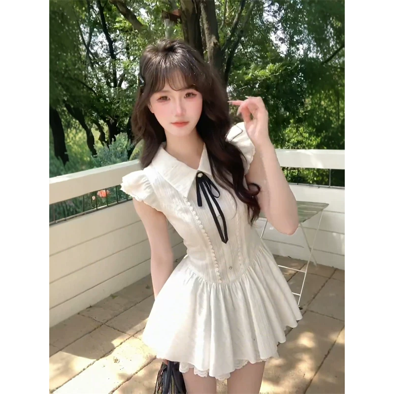 法式温柔风白色小飞袖收腰连衣裙女夏季甜辣妹初恋公主蓬蓬短裙子