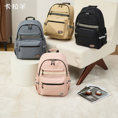 卡拉羊小学生休闲轻便游学包中学生大容量旅游出行女时尚双肩包男