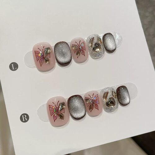 3. Sweet Nude Pink Butterfly Gem Reusable Press Nails