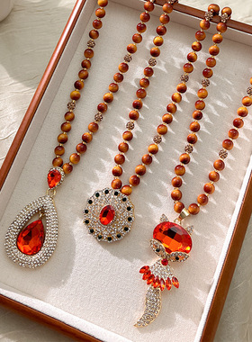 奢华虎眼石女高级感新中式国风复古民族风旗袍长款毛衣链串珠配饰