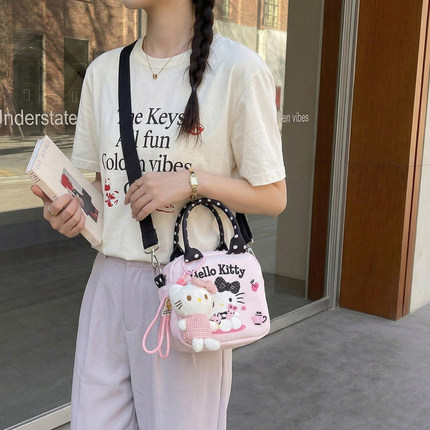 2026新款春夏女日系KT猫涂鸦手机包潮流手提斜挎出行旅游女孩背包