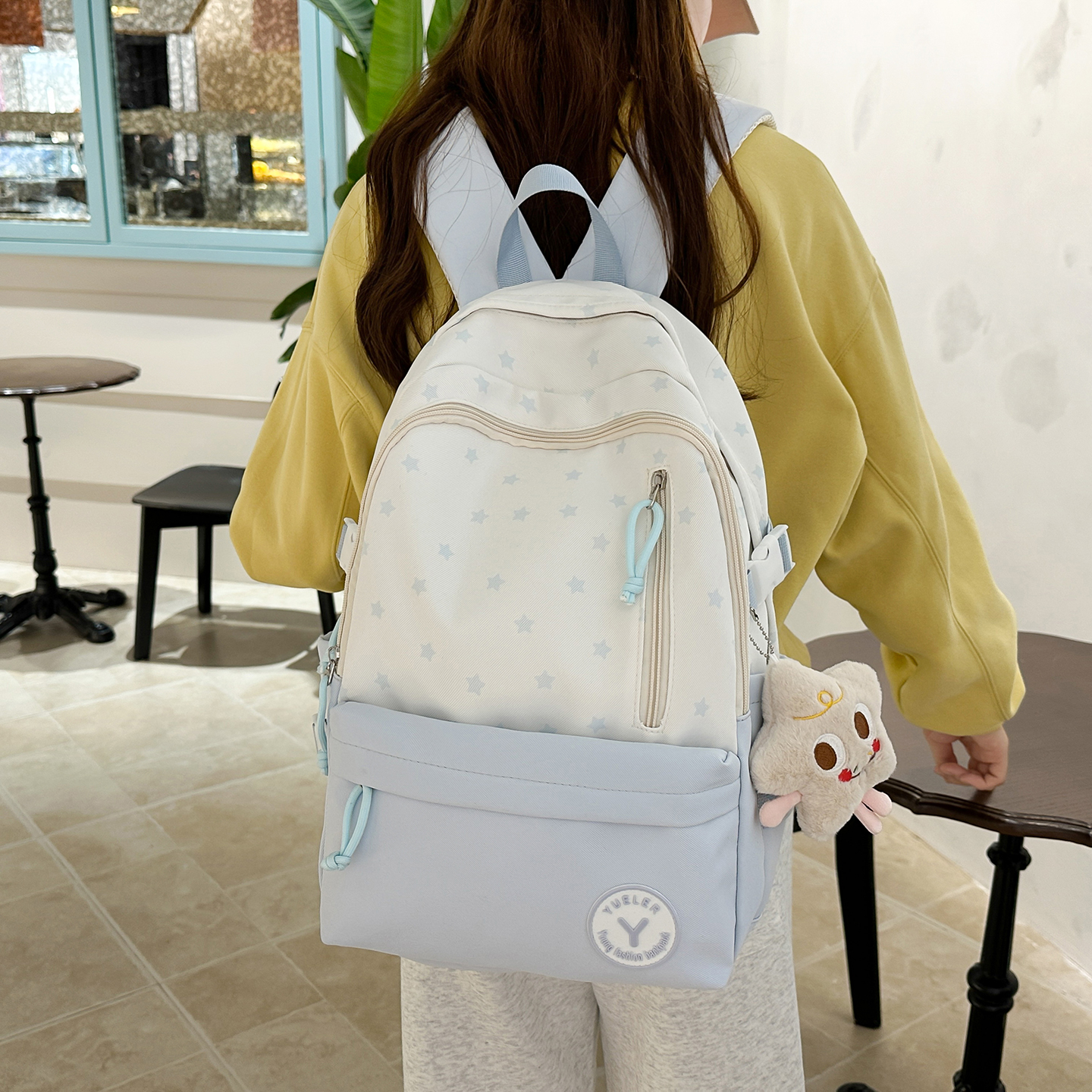 星星双肩包女学生轻便书包