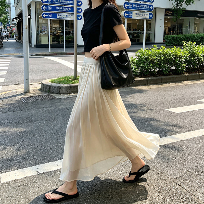 杏色流光纱裙半身裙女夏季2026新款绸面垂感小个子百褶长裙高级感