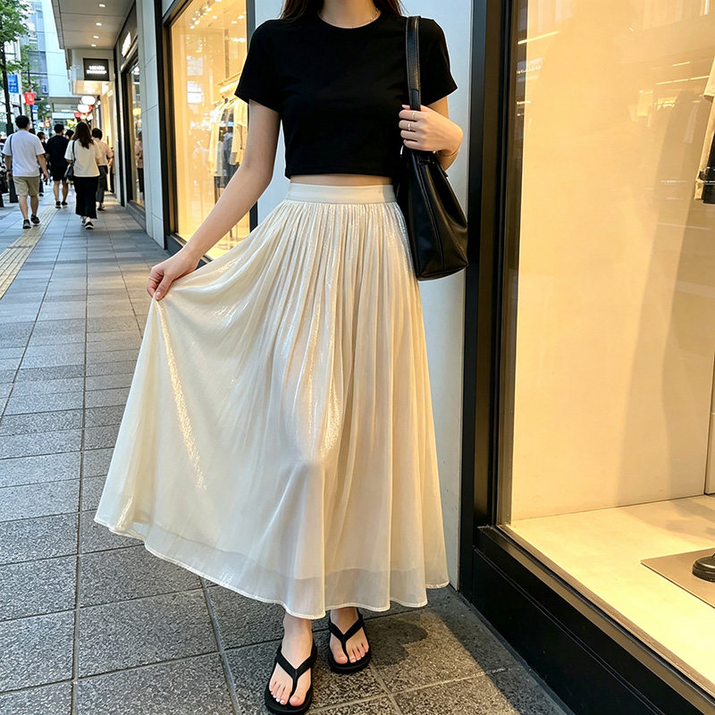 杏色流光纱裙半身裙女夏季2026新款绸面垂感小个子百褶长裙高级感