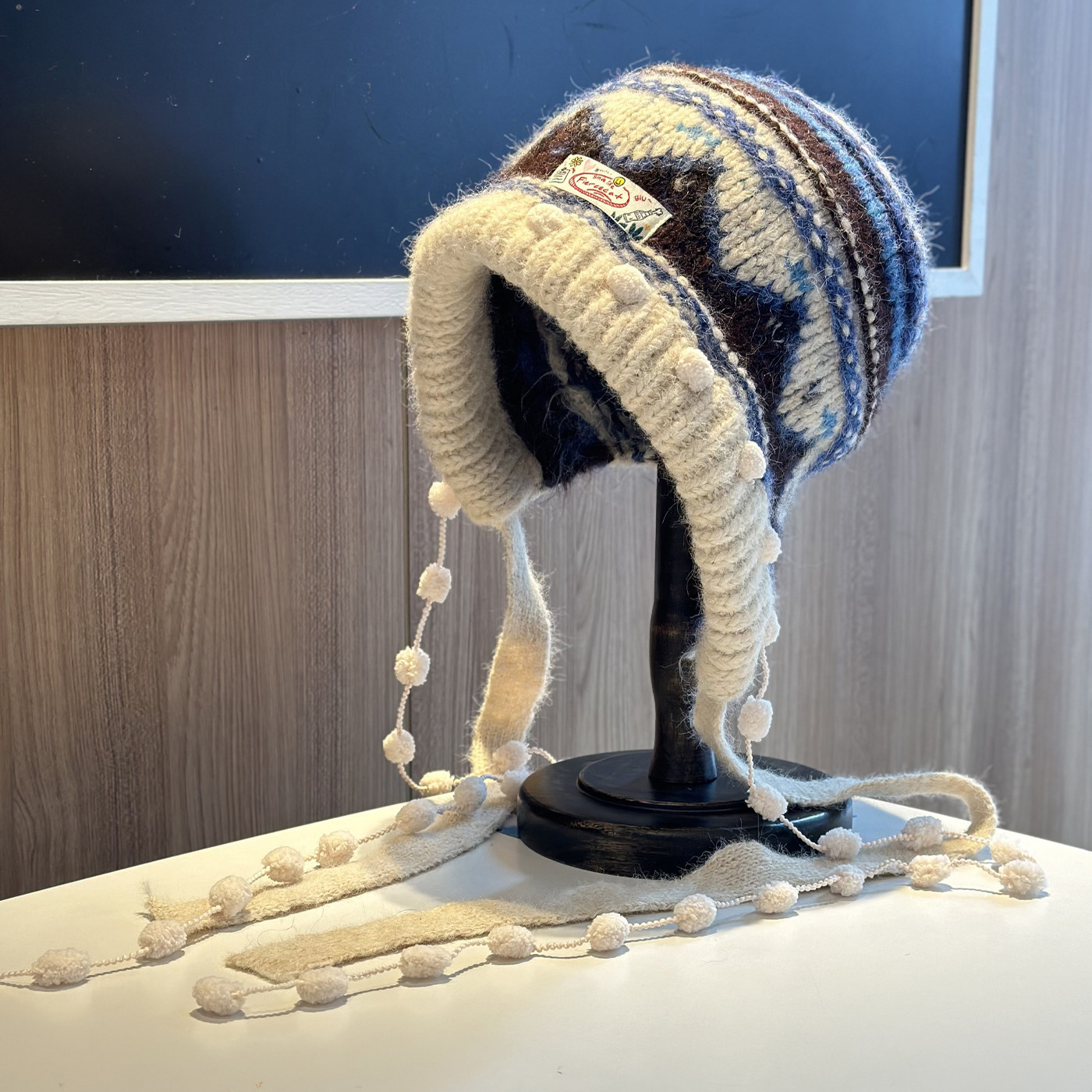 新款费尔岛风绑带针织毛线帽子女秋冬季保暖护耳贴布包头帽流苏