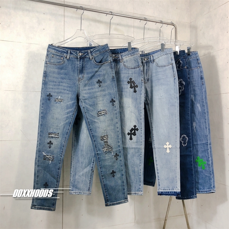 贴皮破洞牛仔长裤蓝色潮牌潇洒