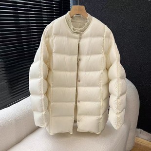 圆领羽绒服女中长款2025冬新款针织拼接泡芙韩版宽松黄色方块外套