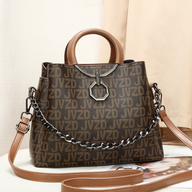 欧米蜘蛛王女包官方旗舰店正品2024新款时尚百搭单肩手提包水桶包