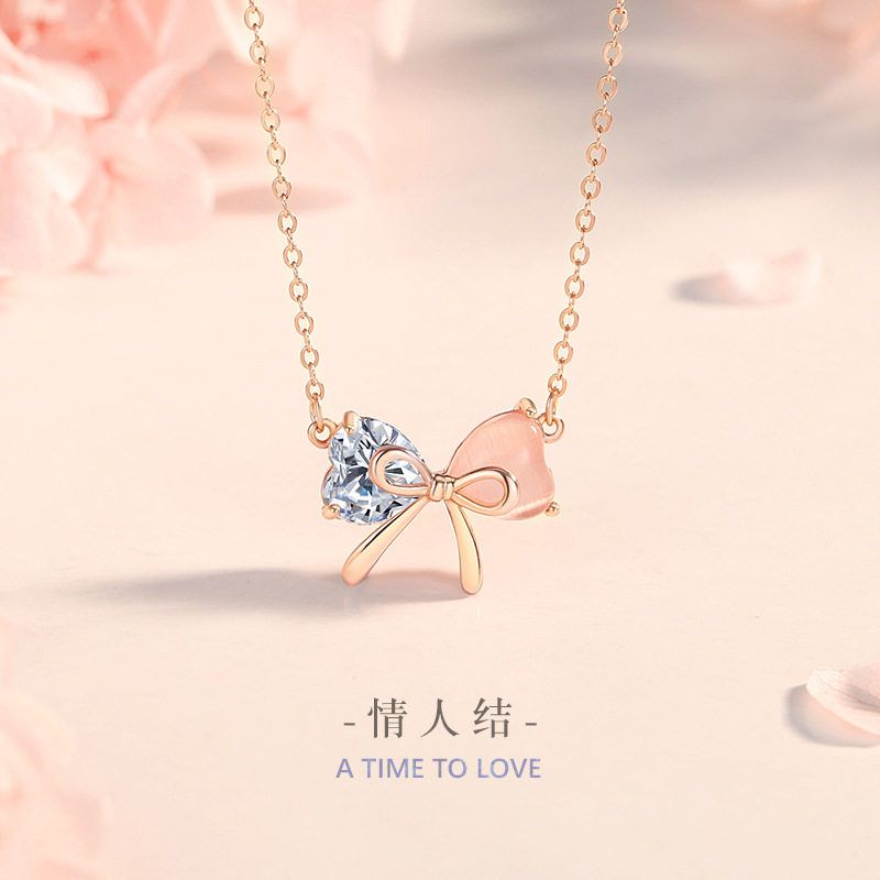 蝴蝶结纯银925项链女小众设计轻奢款猫眼石锁骨链得物ins爱心吊坠