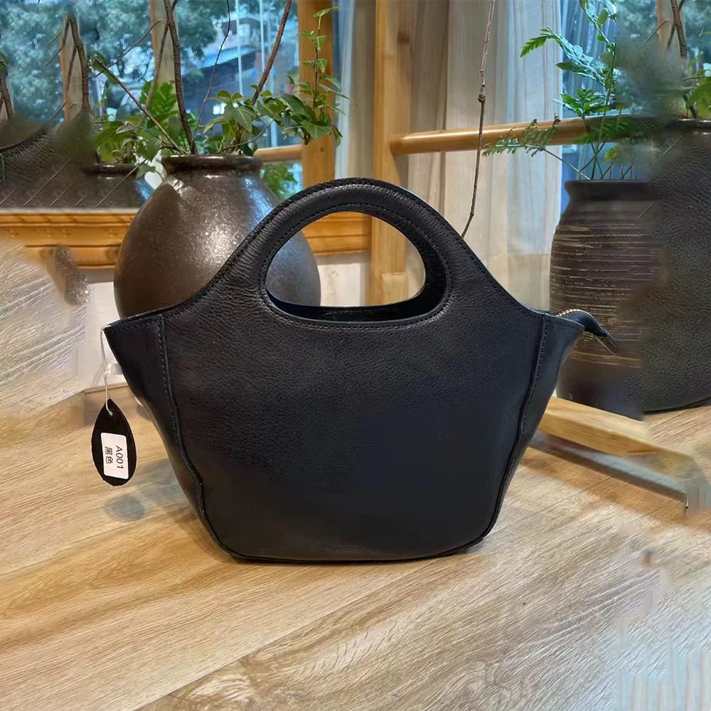 手工原创进口头层植鞣牛皮复古女士单肩斜挎包真皮饺子包手提包