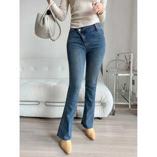 周大大11.11新品  微喇牛仔裤女秋款显瘦复古不规则斜扣裤子