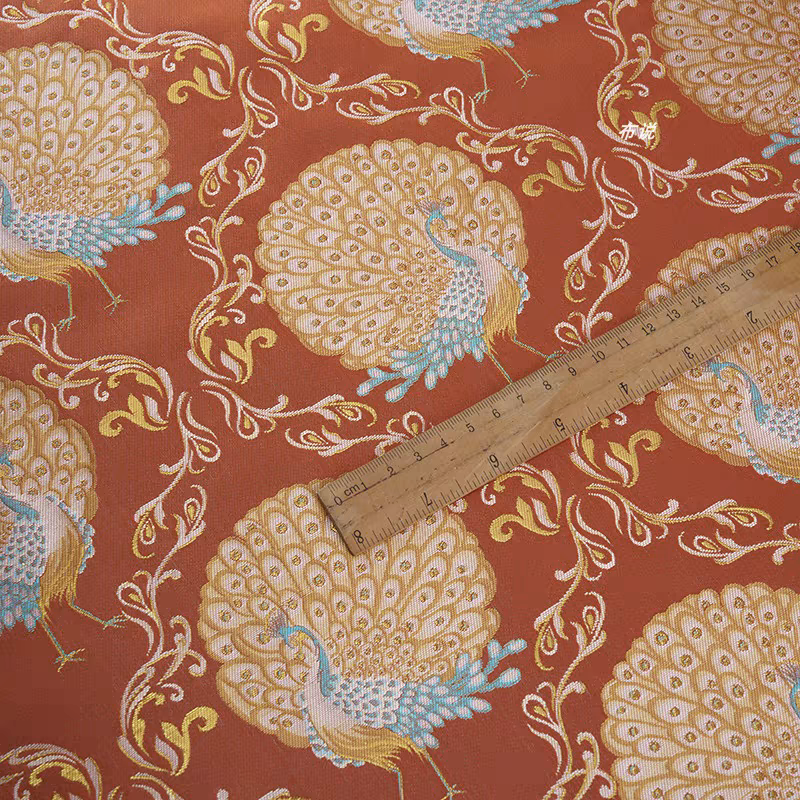 桔红橙色 孔雀起舞织锦缎提花面料 中式汉服外套马甲金丝闪亮布料