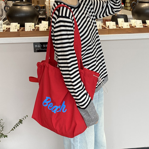 韩系ins字母印花尼龙包休闲百搭单肩包便携抽绳大容量托特包