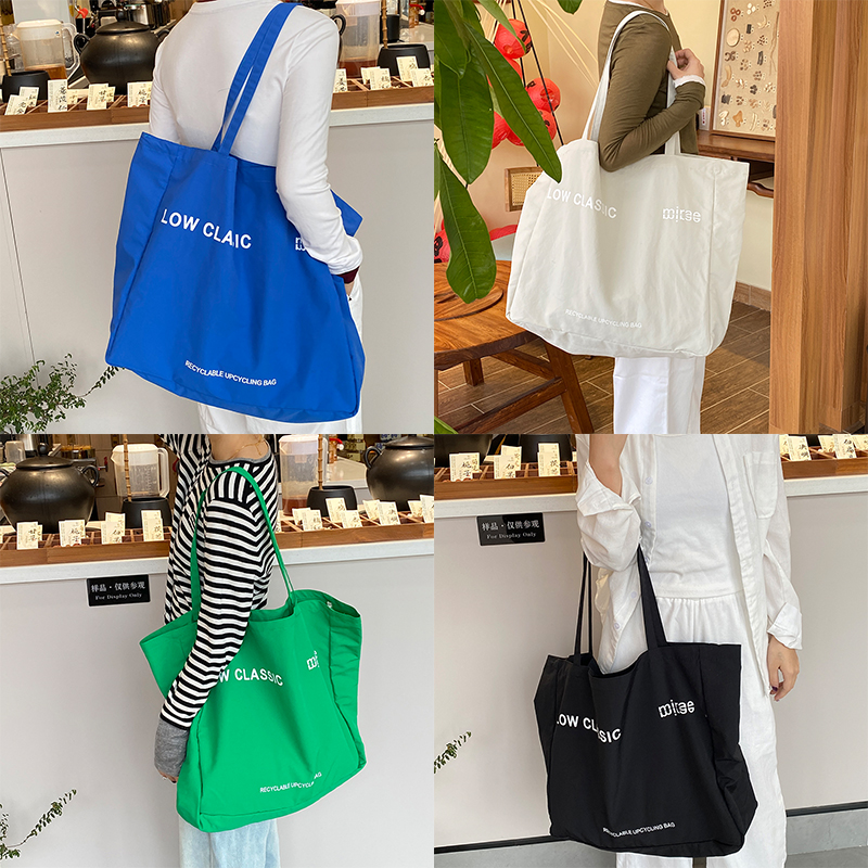 唐糖包袋简约纯色字母托特包新款潮大容量出街学生上课单肩腋下包