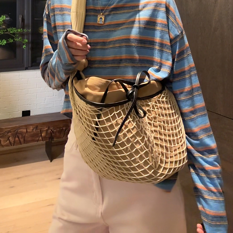 LUNA“美感王者”重工编织网兜斜挎慵懒风单肩镂空羊皮饺子包