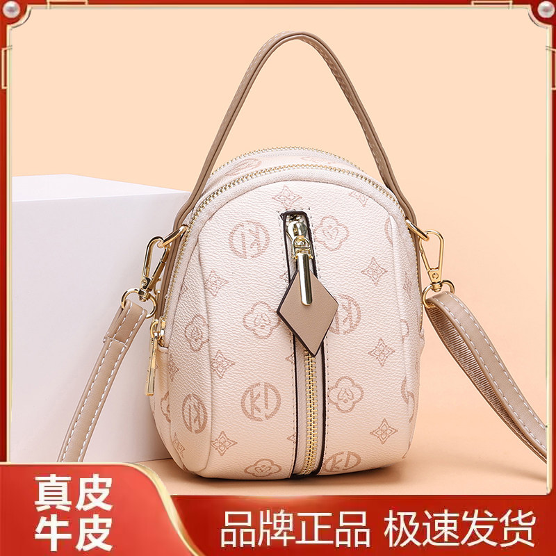 雅格莱诗真皮印花圆筒斜挎女包
