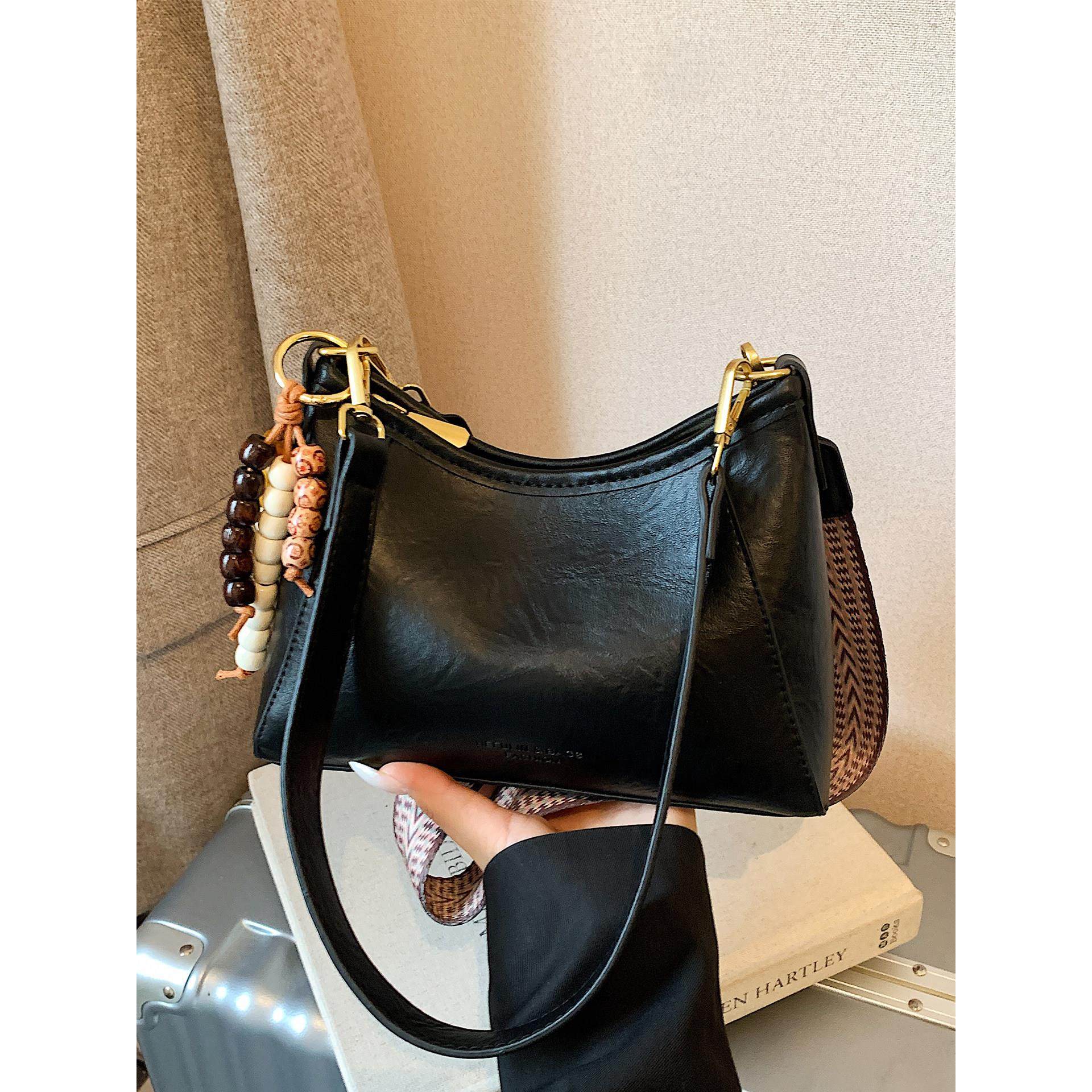 精致腋下包包女式2025新款潮高级感复古百搭单肩包通勤斜挎水桶包,箱包皮具/热销女包/男包,水桶包,淘宝优惠券,粉丝福利购,淘宝优惠卷