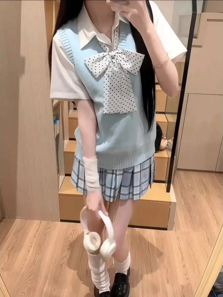 原创jk制服学院风女初秋天蓝色v领针织马甲背心毛衣叠穿格裙套装