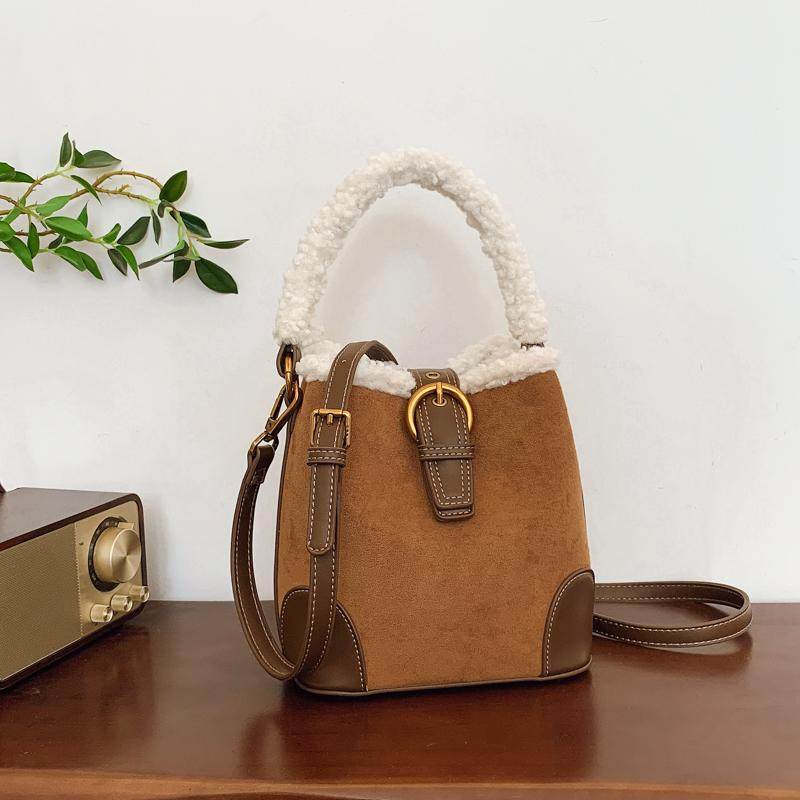 北包包正品秋冬款复古水桶包包毛茸茸包包女手提单肩斜挎包手提包