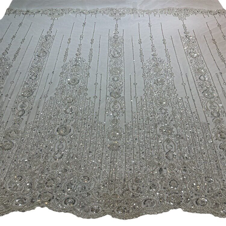 婚纱礼服蕾丝连衣裙面料 单边白色亮片珠片绣刺绣面料 绣花布料