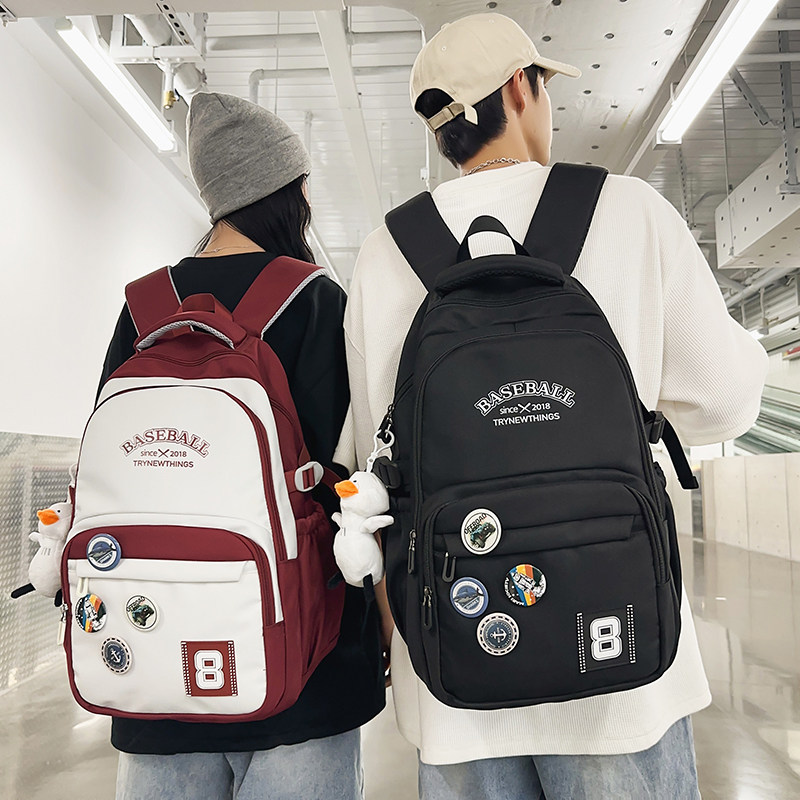 书包女大学生休闲简约大容量电脑背包撞色初中生高中旅行双肩包男