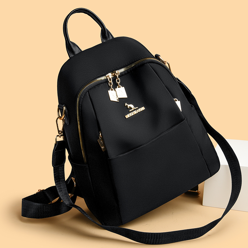 牛津布双肩包女2025新款时尚百搭轻便大容量书包简约通勤旅行背包